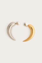 Horn Earrings with Pearl
WOMAN Pucci